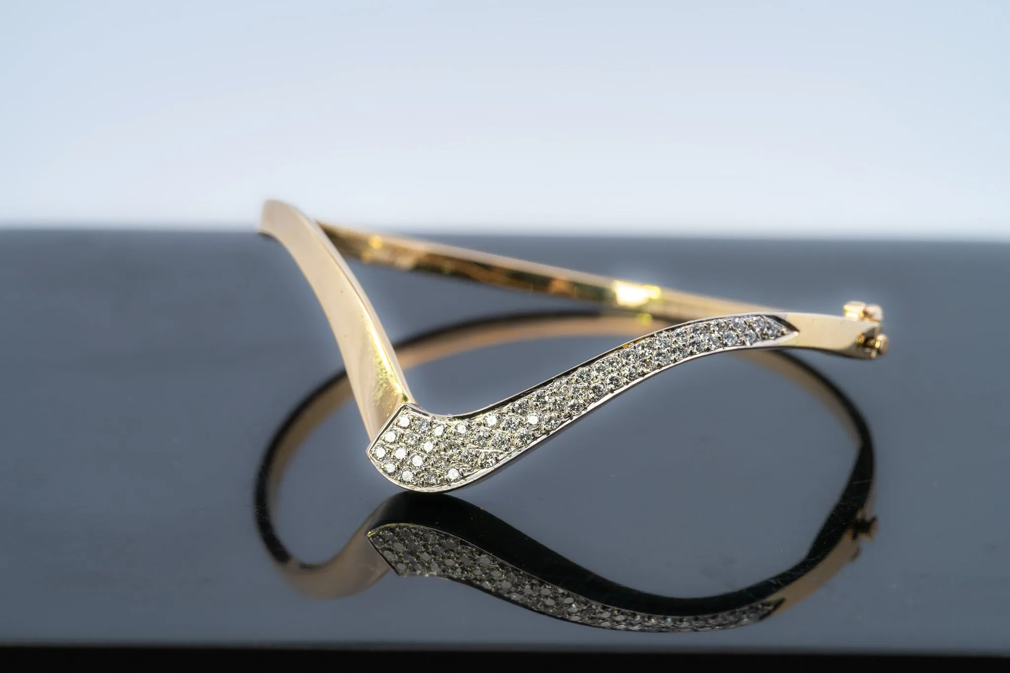 18ct Yellow & White Gold 52 stone Diamond Bangle.
