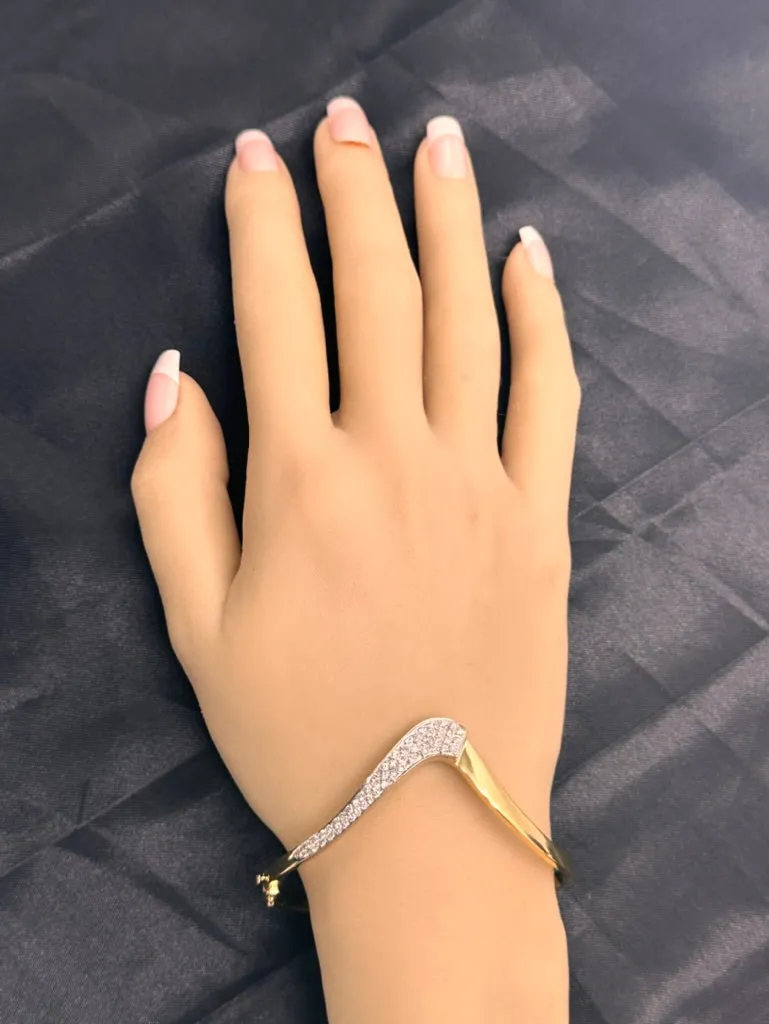 18ct Yellow & White Gold 52 stone Diamond Bangle.