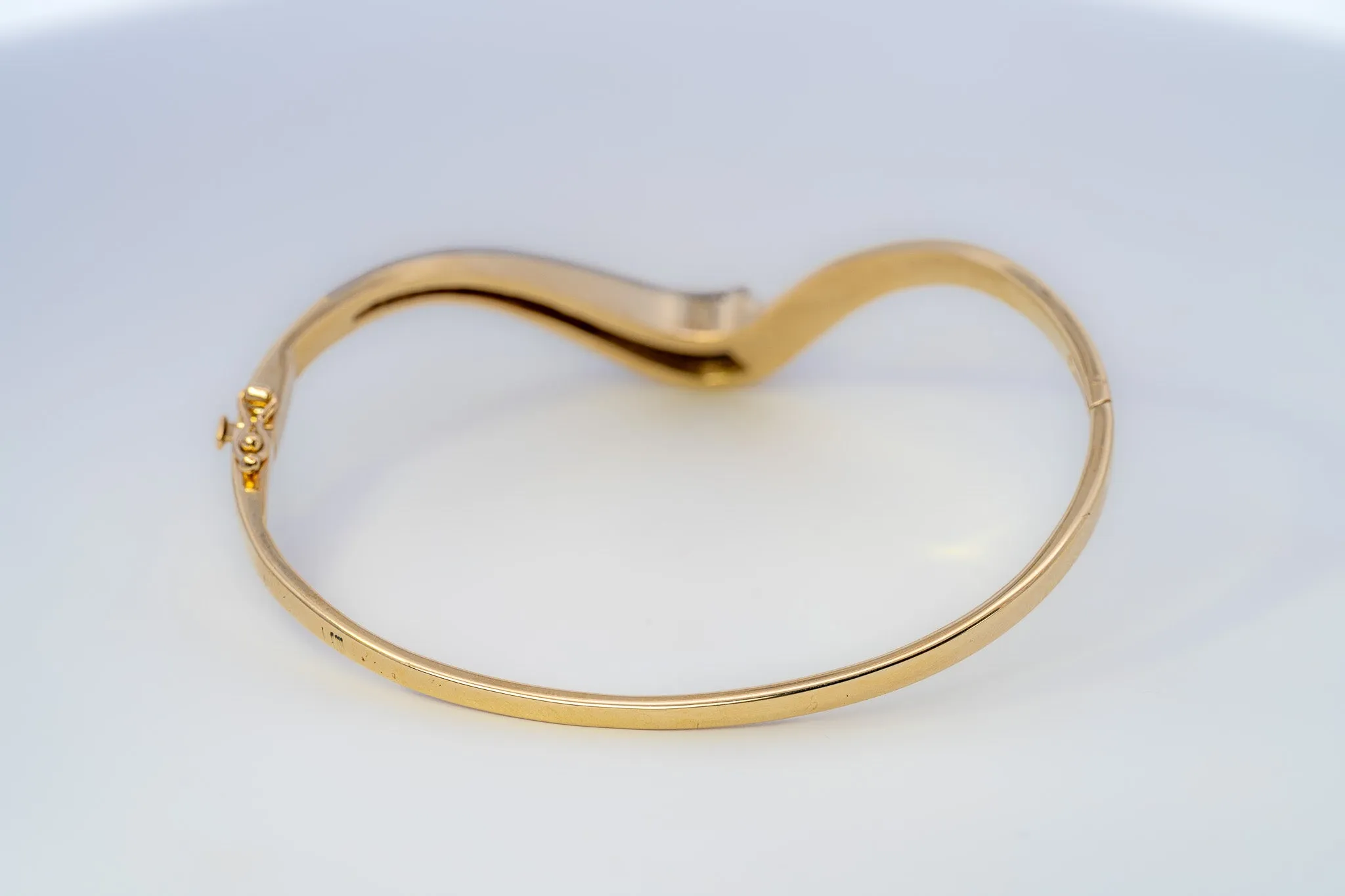 18ct Yellow & White Gold 52 stone Diamond Bangle.