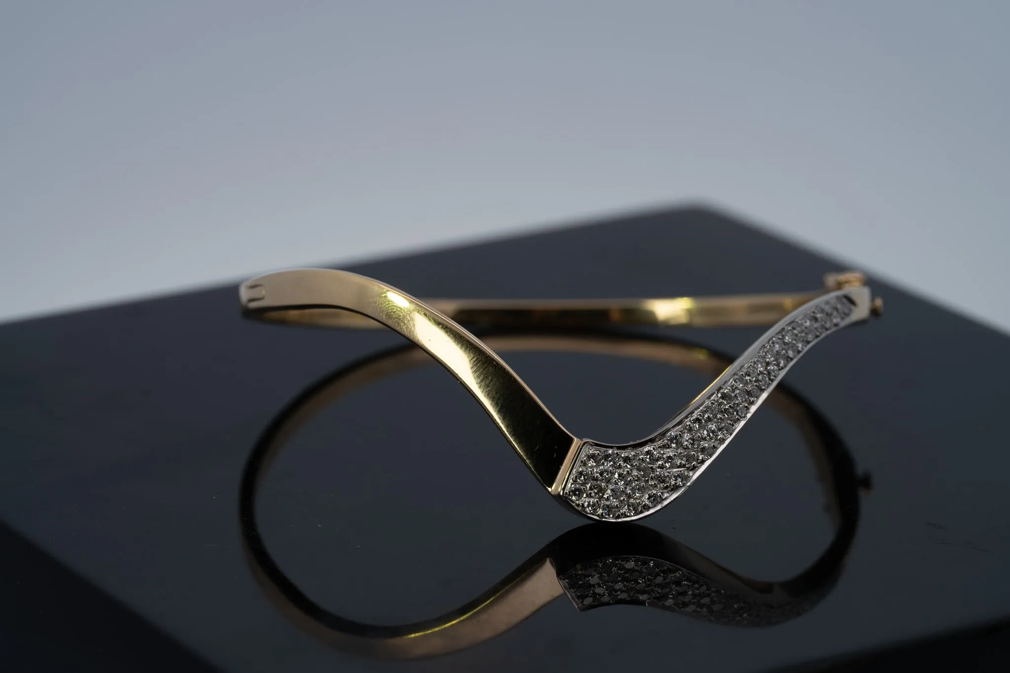 18ct Yellow & White Gold 52 stone Diamond Bangle.
