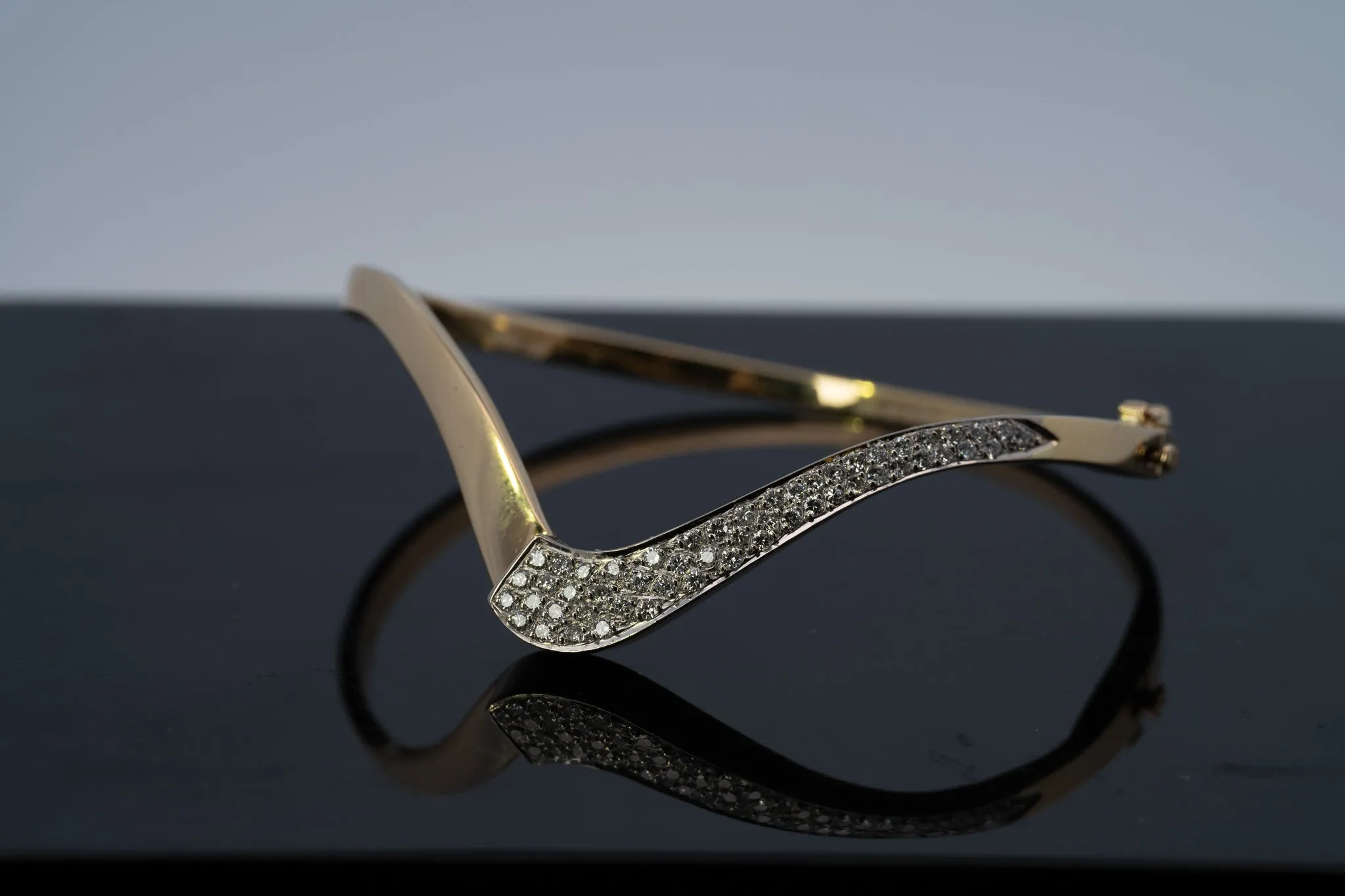 18ct Yellow & White Gold 52 stone Diamond Bangle.