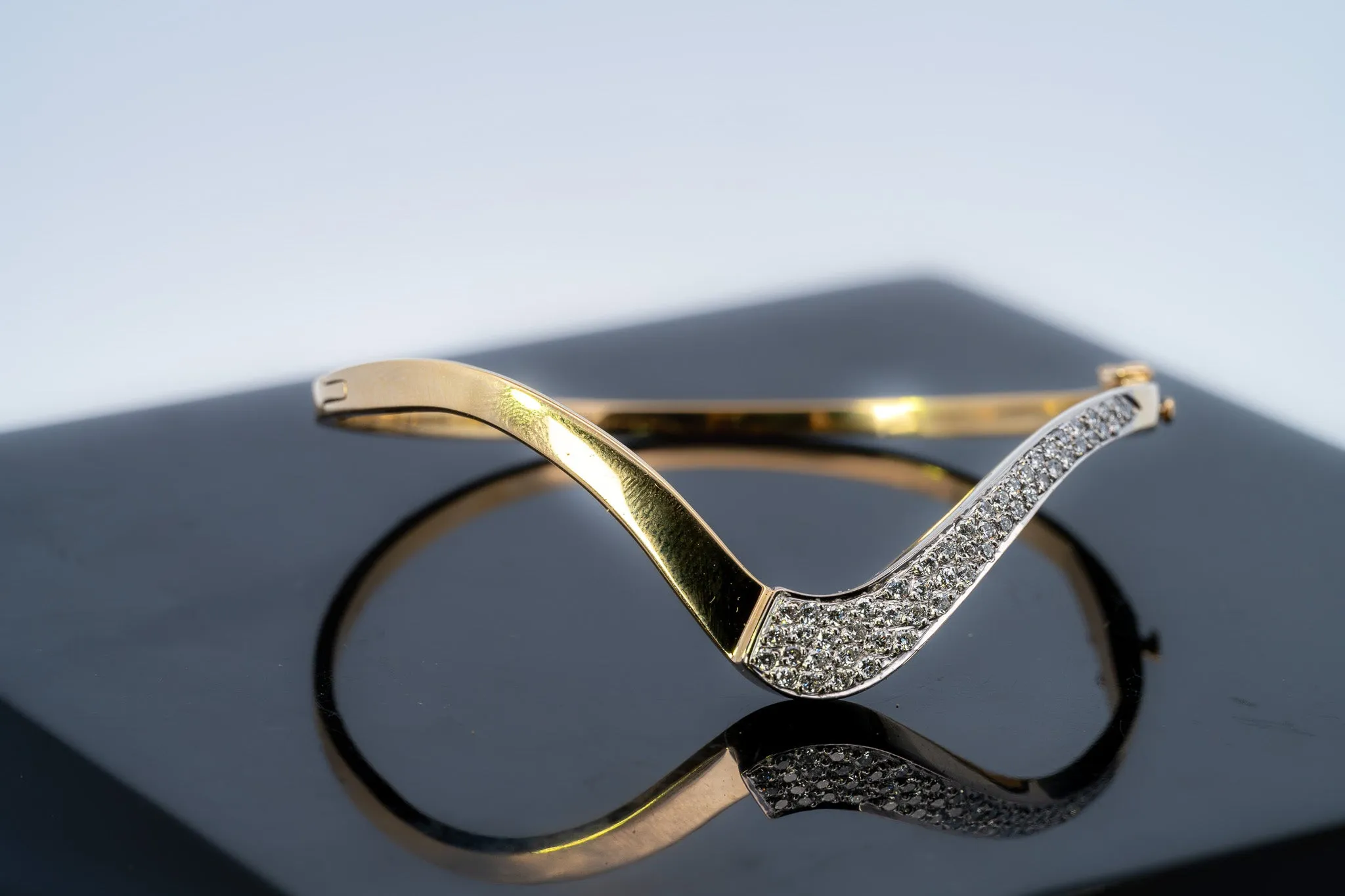 18ct Yellow & White Gold 52 stone Diamond Bangle.
