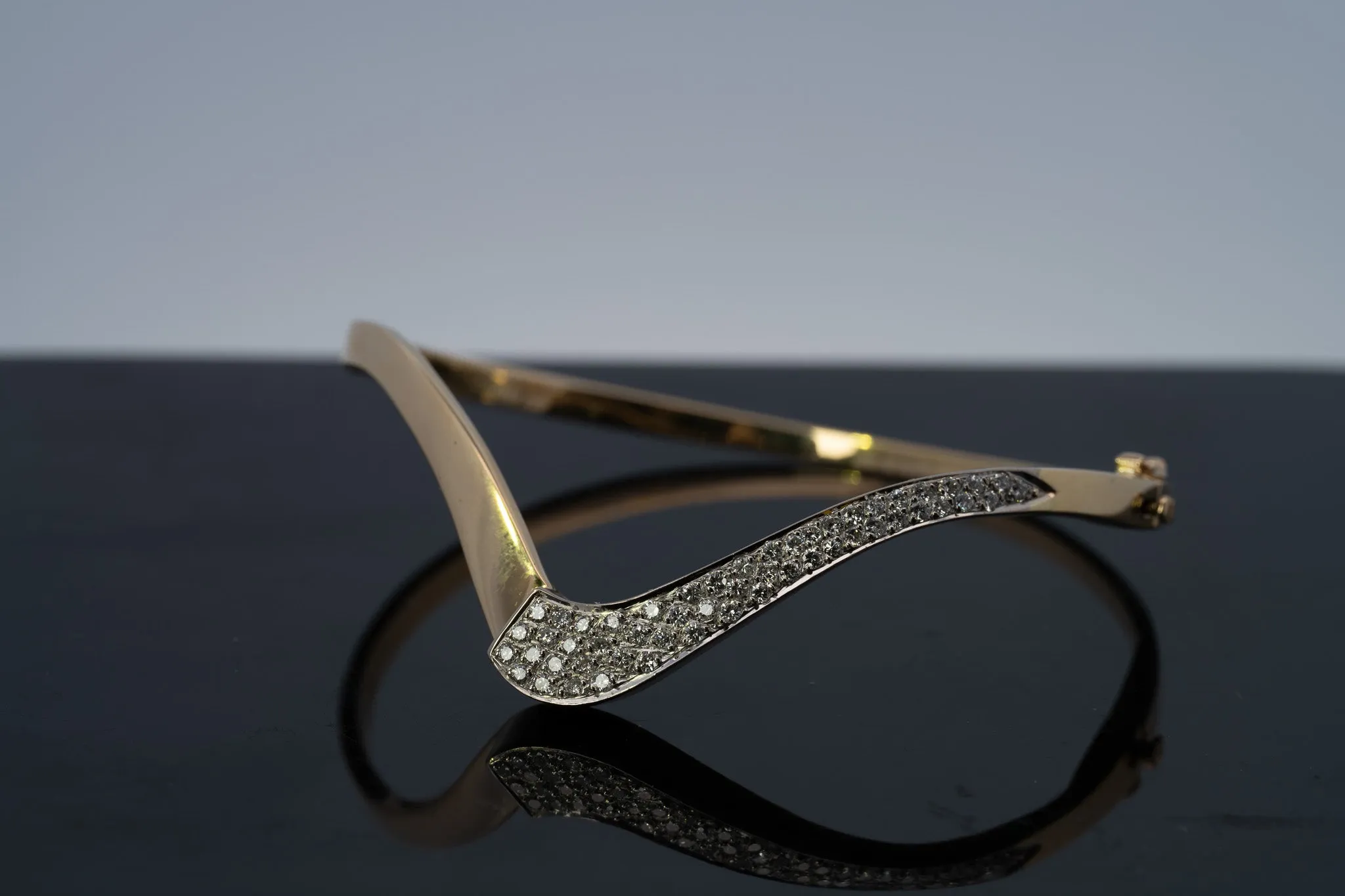 18ct Yellow & White Gold 52 stone Diamond Bangle.