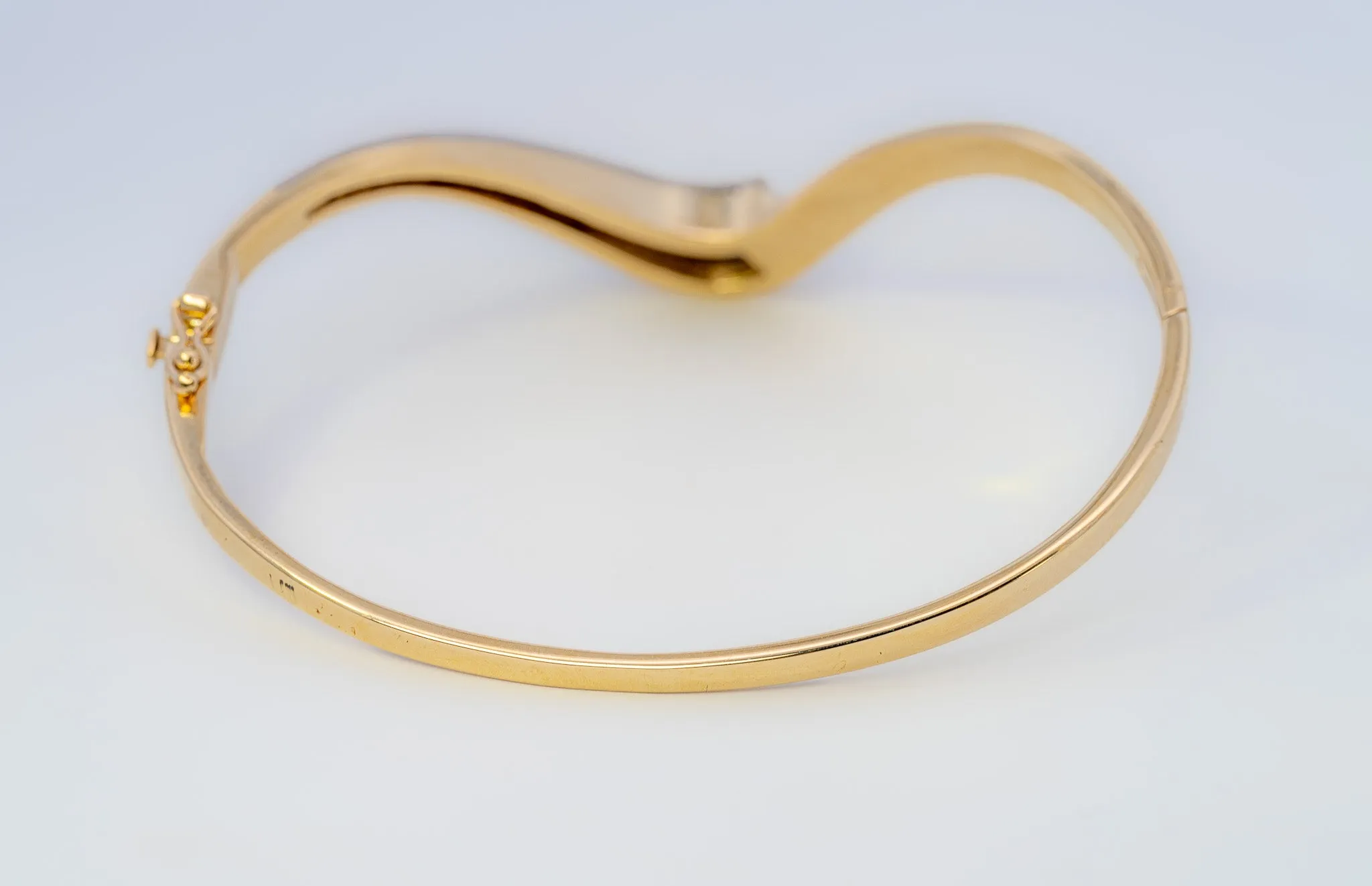 18ct Yellow & White Gold 52 stone Diamond Bangle.