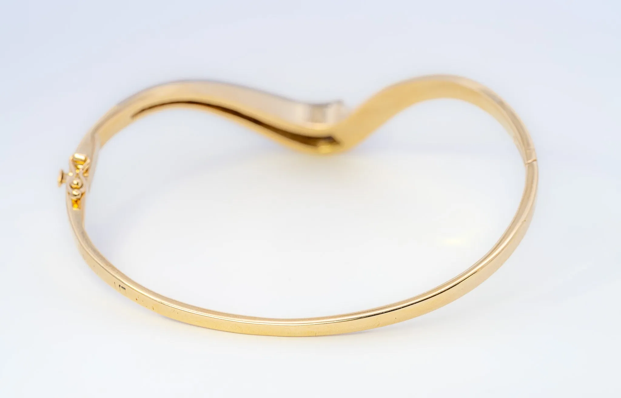 18ct Yellow & White Gold 52 stone Diamond Bangle.