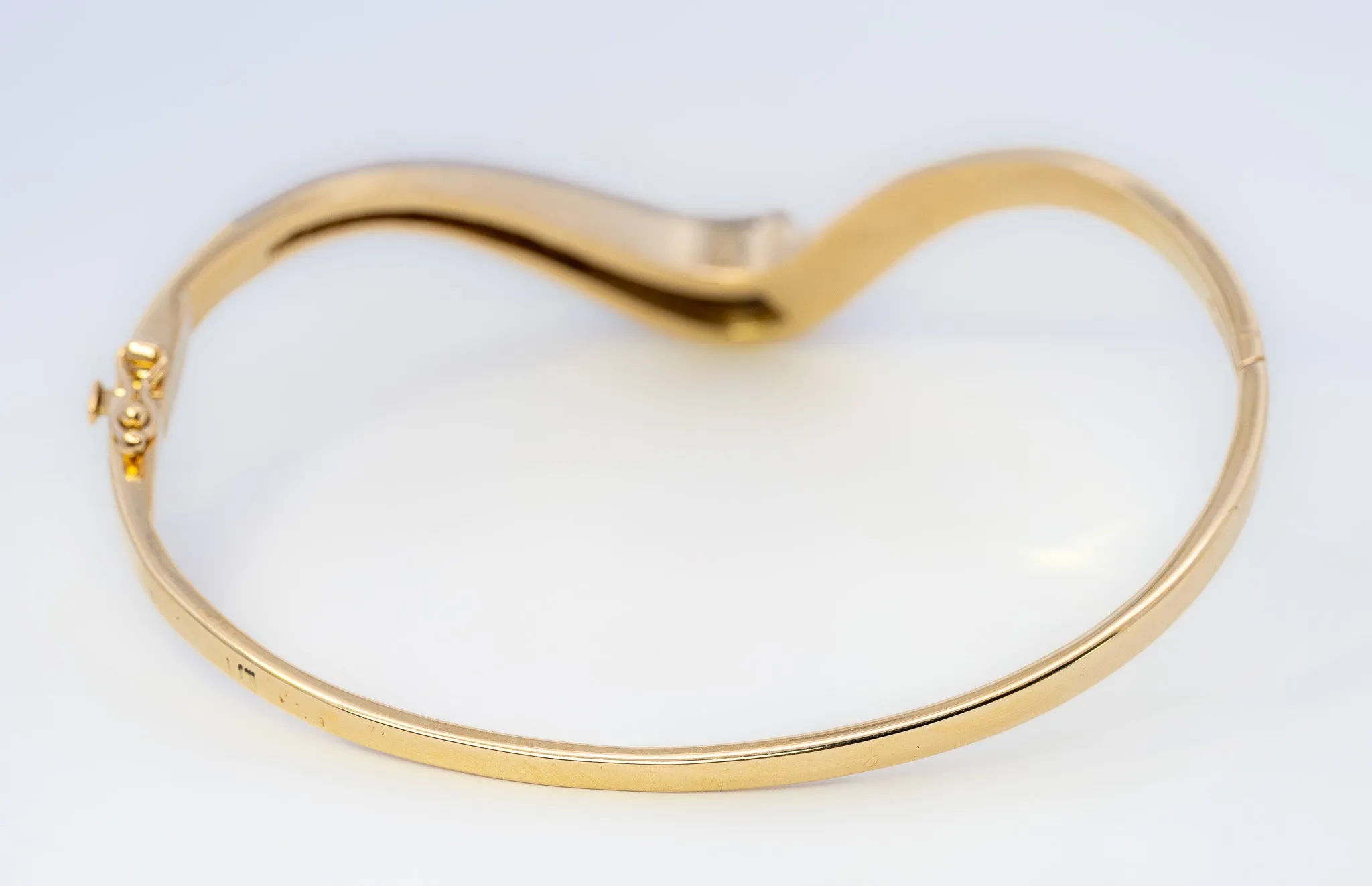 18ct Yellow & White Gold 52 stone Diamond Bangle.