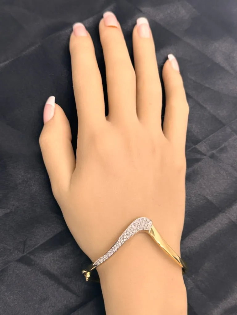 18ct Yellow & White Gold 52 stone Diamond Bangle.