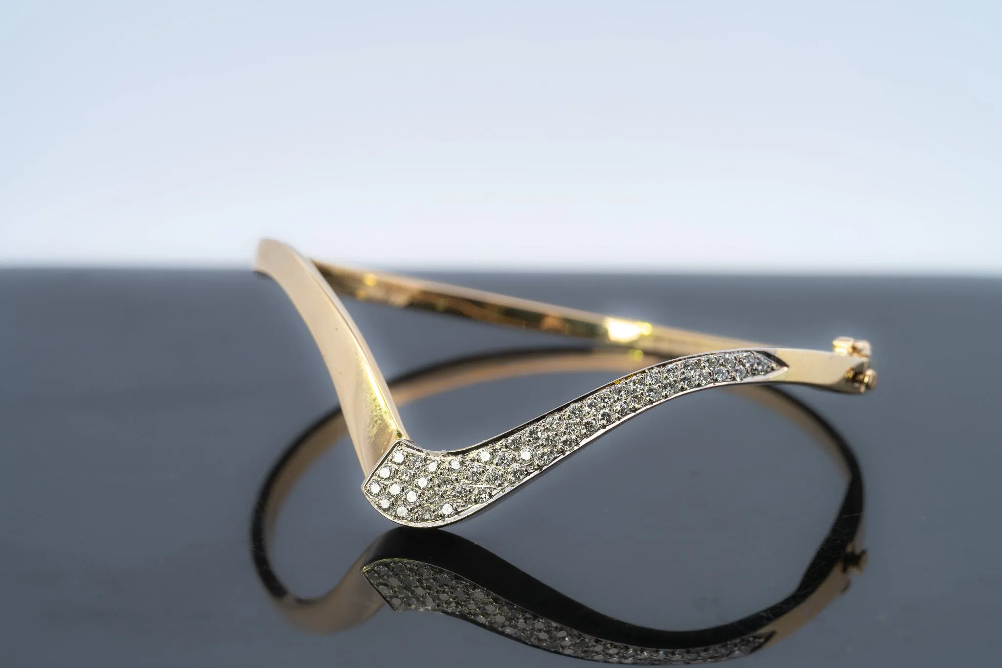 18ct Yellow & White Gold 52 stone Diamond Bangle.