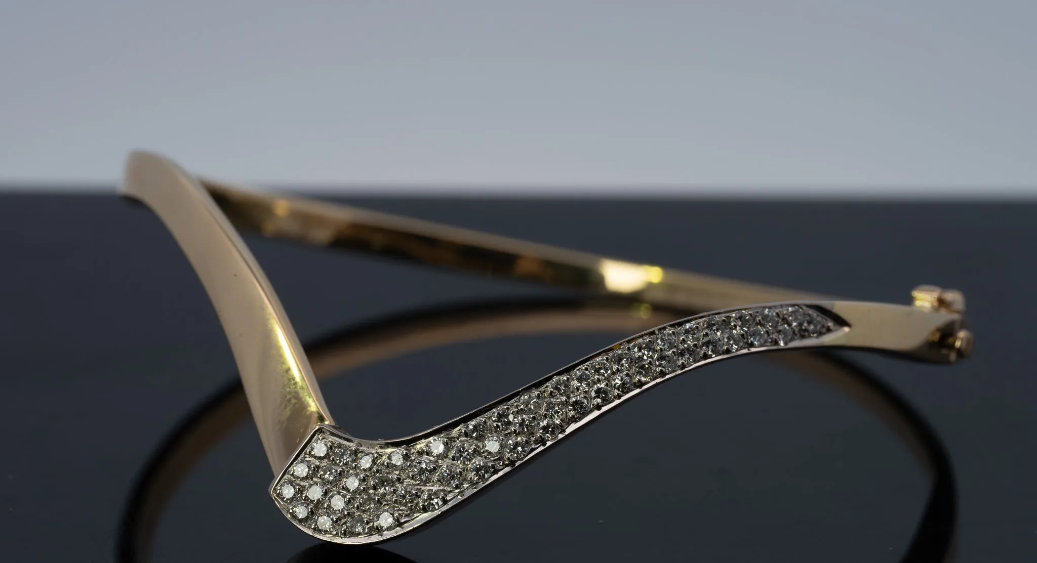 18ct Yellow & White Gold 52 stone Diamond Bangle.