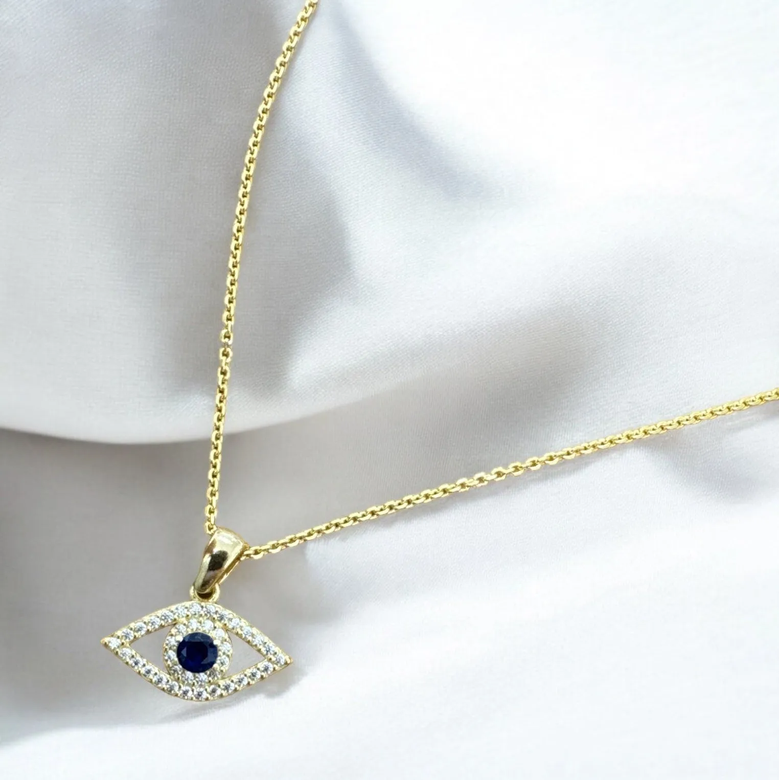 Elliptical Evil Eye Necklace Dipped in Gold