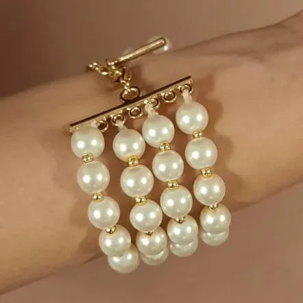 Estele Gold Plated Glowing Four Line White Pearl Bracelet for Girls & Women