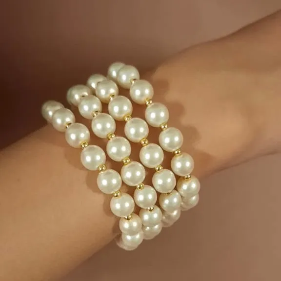 Estele Gold Plated Glowing Four Line White Pearl Bracelet for Girls & Women